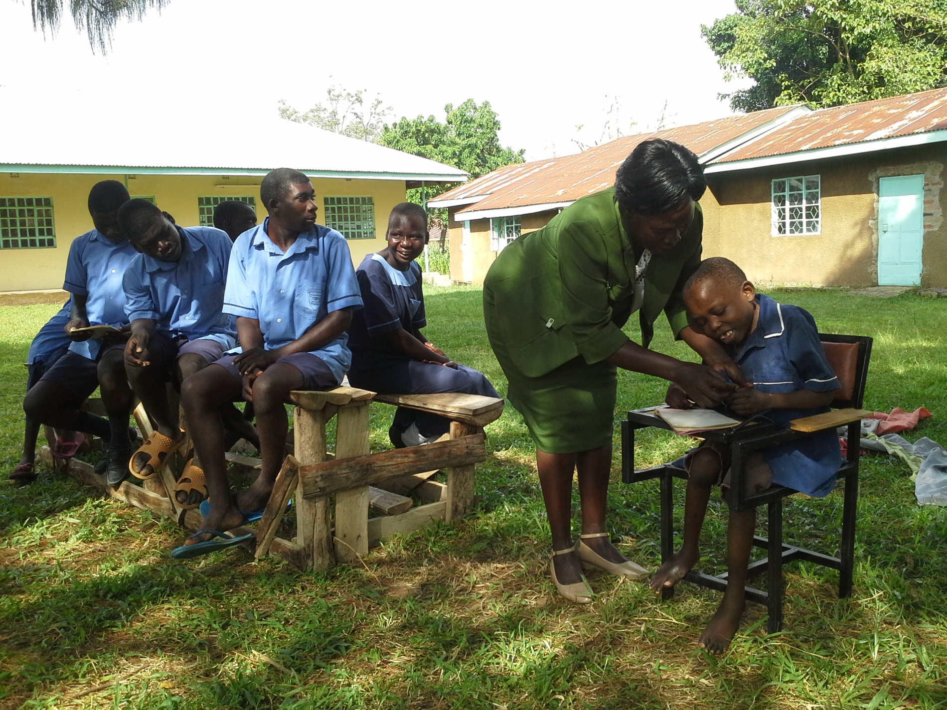 4-Teacher Joan Assisting a Mentally Handicapped Pupil-1 